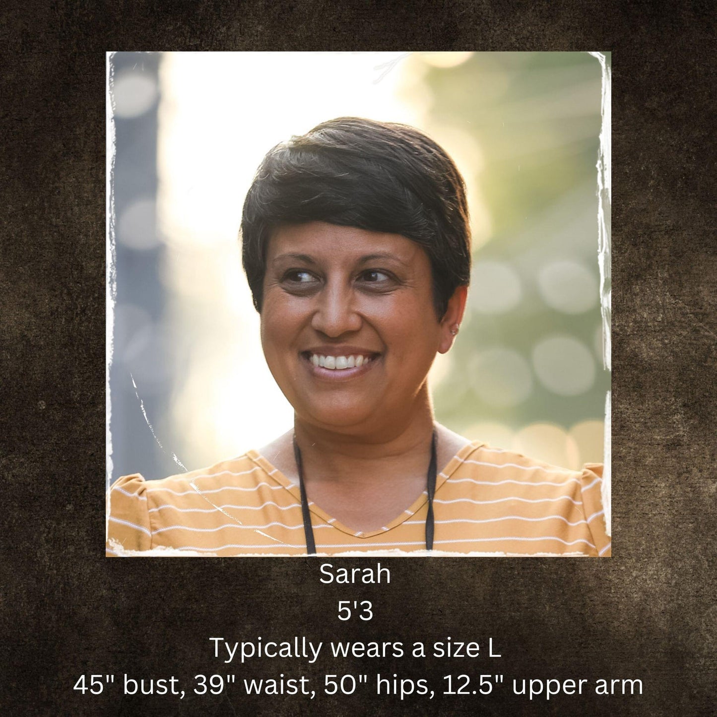 Woman smiling in striped shirt with model stats text