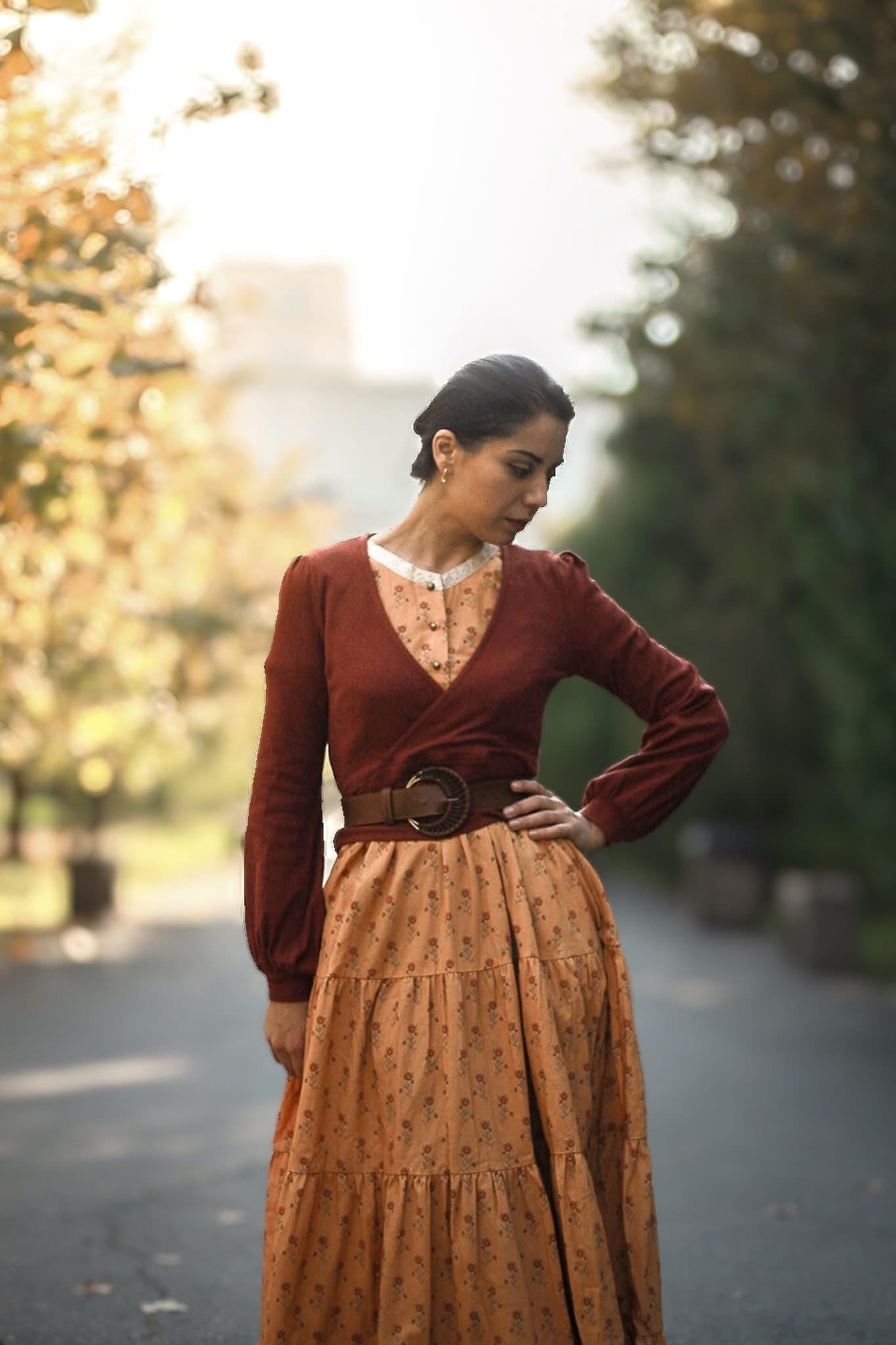 Woman in top tiered skirt outdoors