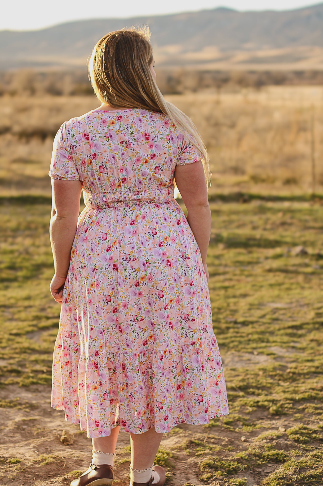 woman wearing a modest nursing floral dress