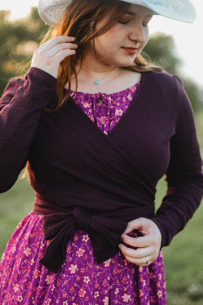 Woman in modest nursing wrap and floral skirt