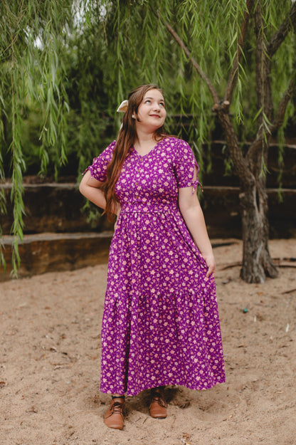 Woman in modest nursing floral dress outdoors