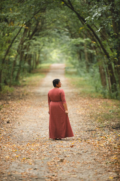 Woman wearing modest nursing copper maxi dress