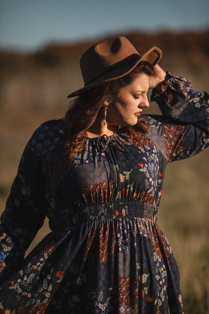 woman wearing a modest nursing floral dress