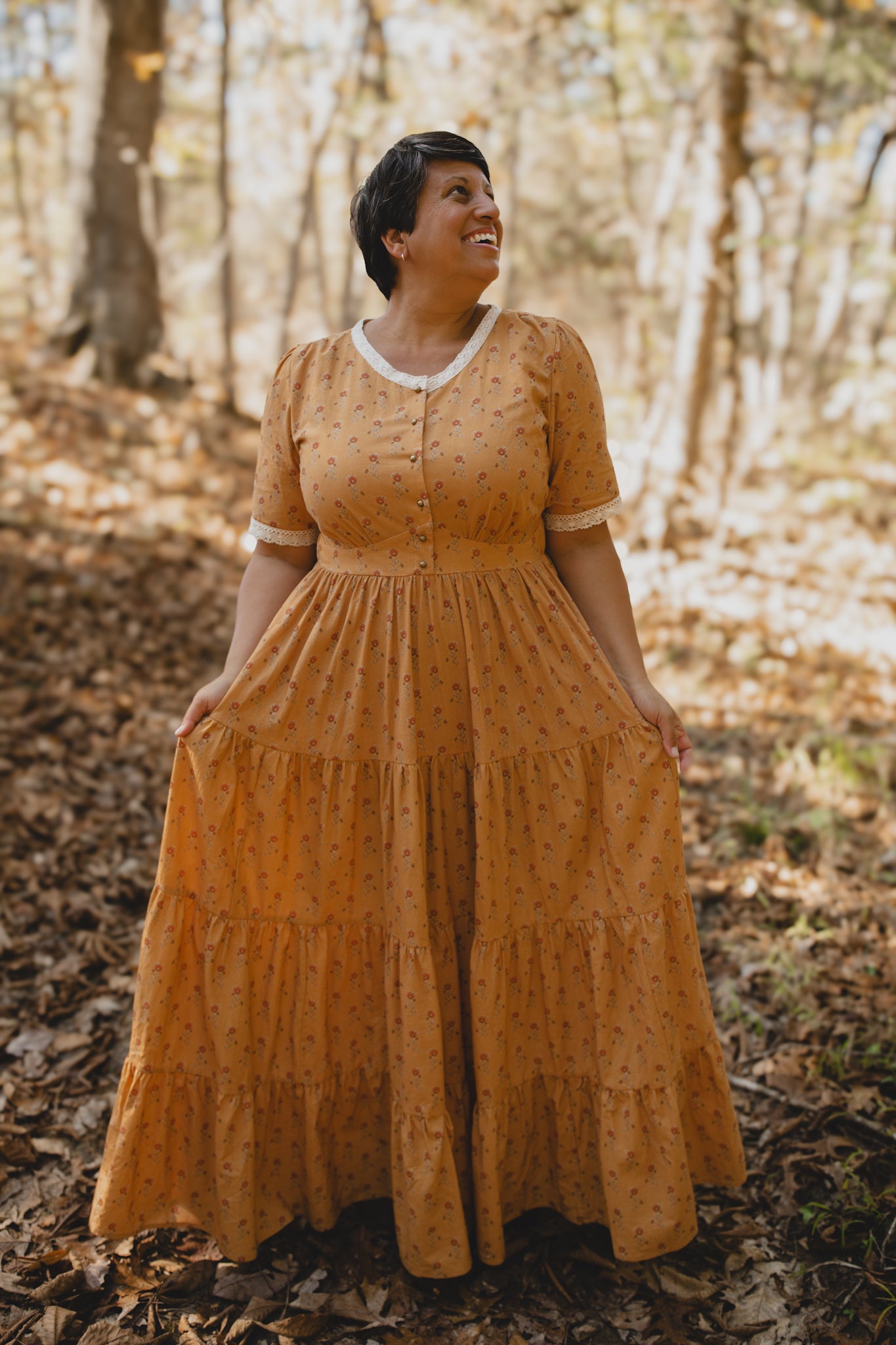 Woman in modest nursing dress yellow forest