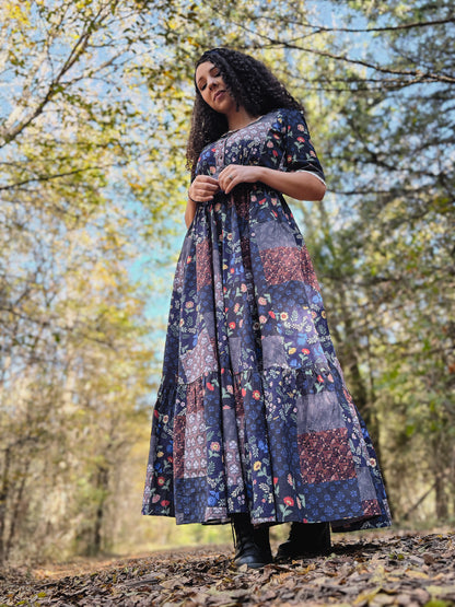 woman wearing a modest nursing patterned dress
