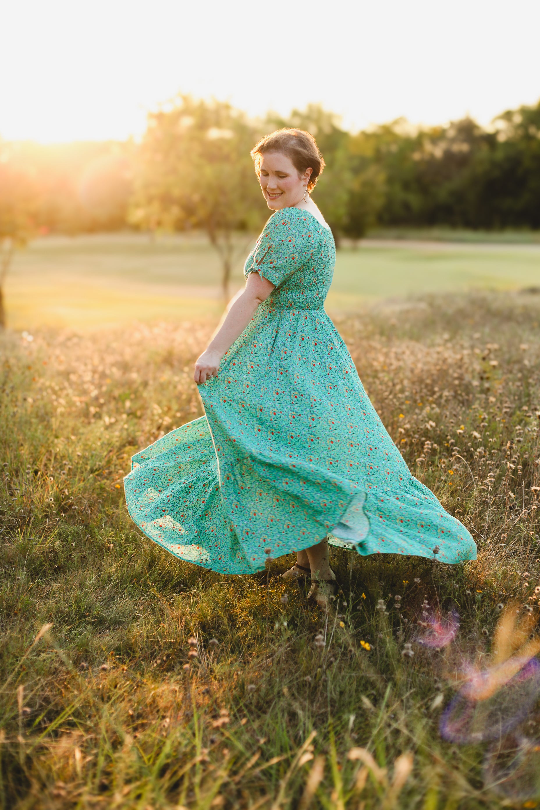 Woman in modest nursing teal dress outdoors