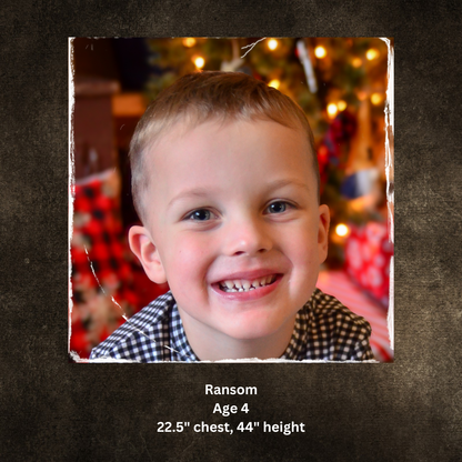 Child smiling with Christmas decorations