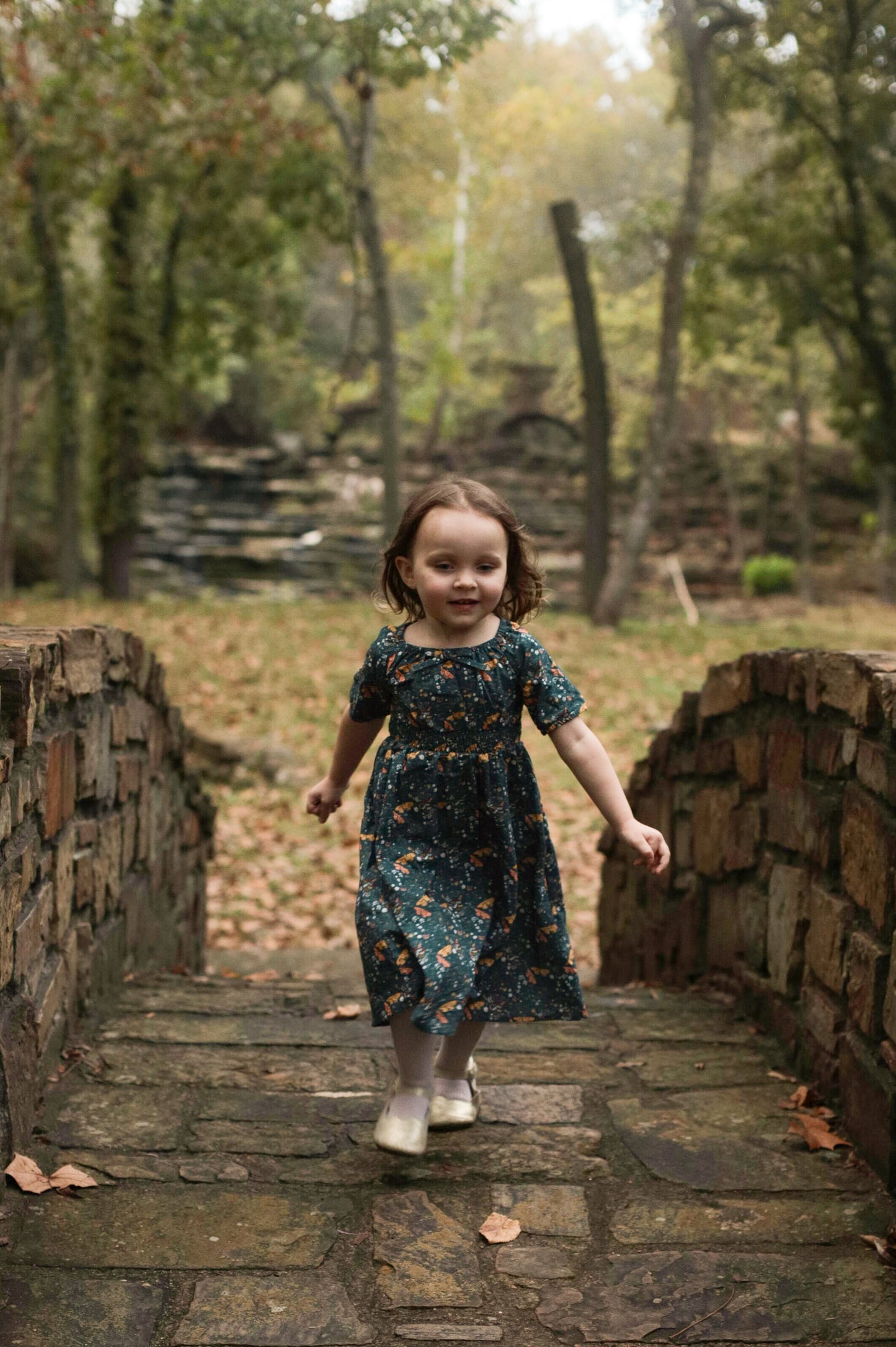 Child in modest dress outdoors