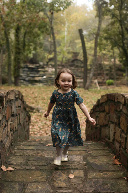 Child in modest dress outdoors