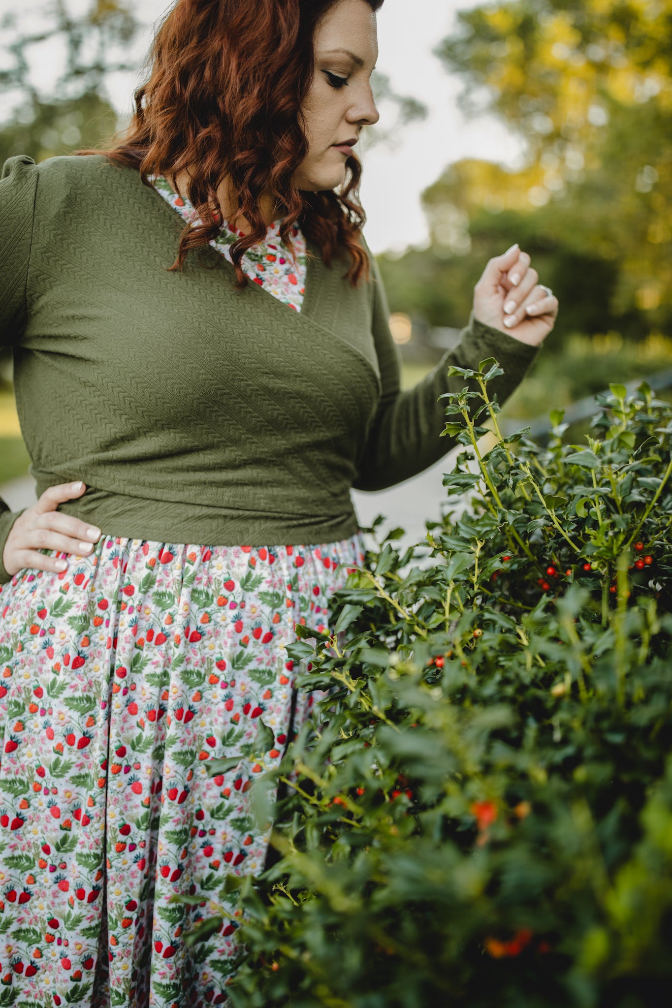 Woman in modest nursing wrap and floral skirt