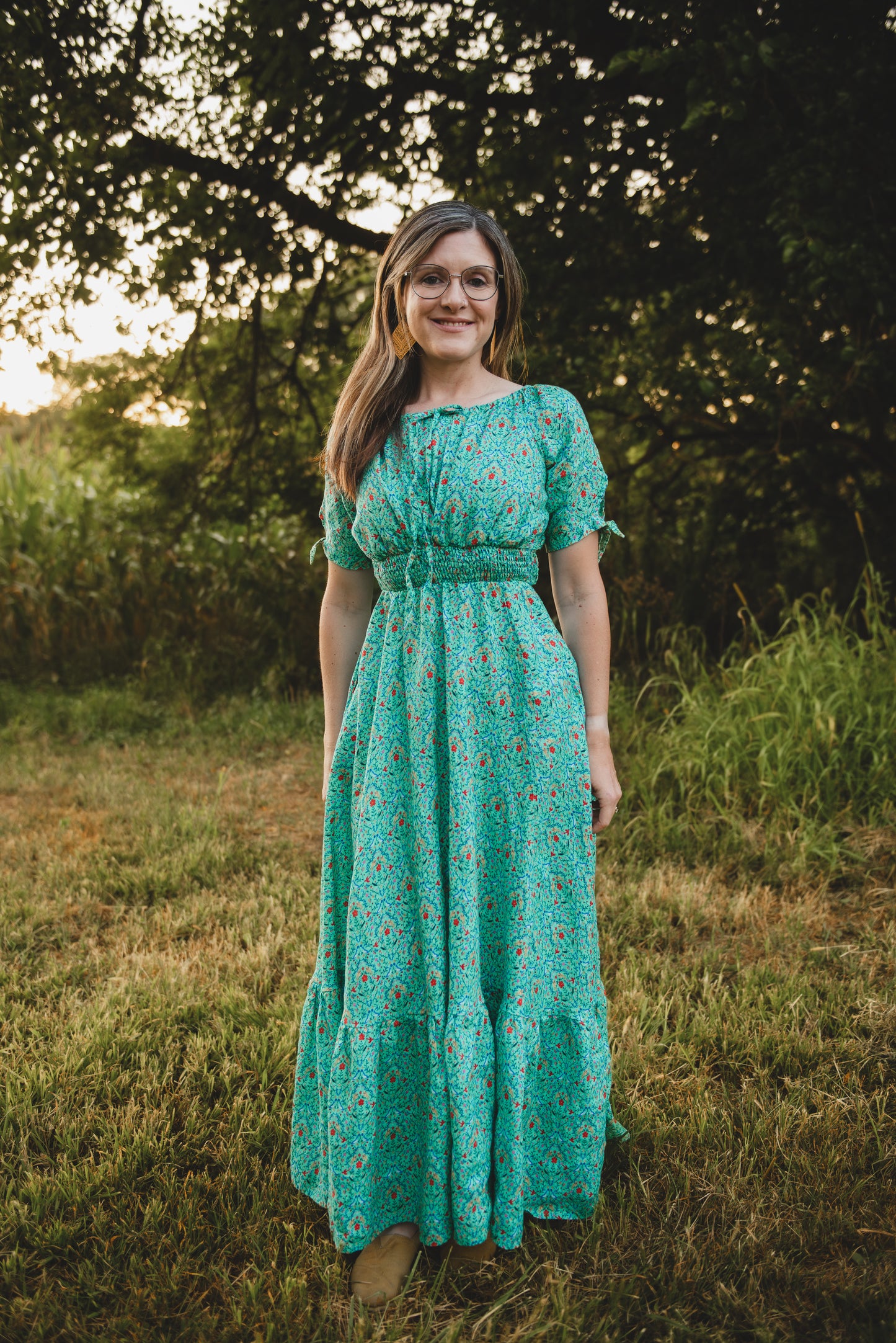 woman wearing a modest nursing green dress