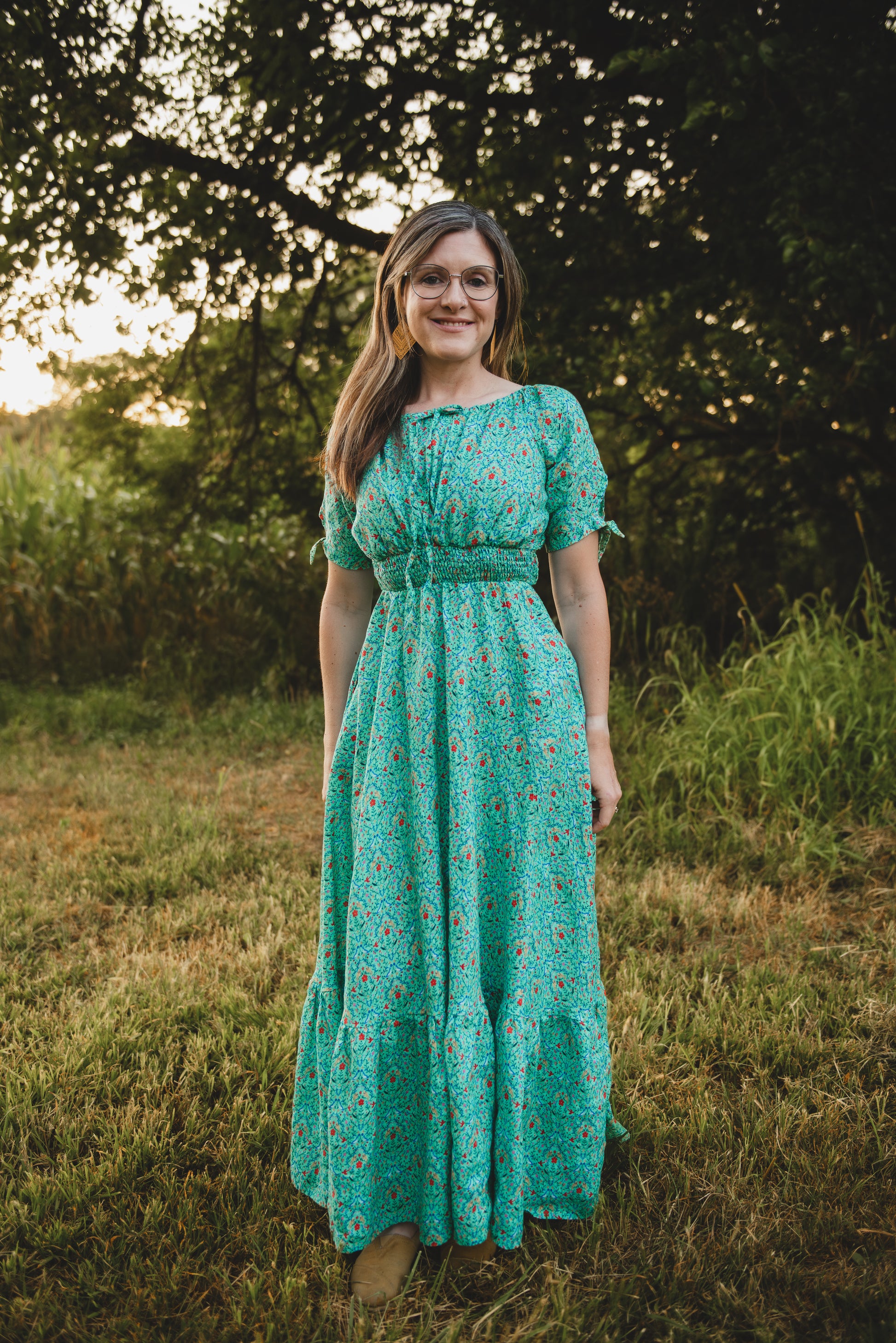 woman wearing a modest nursing green dress