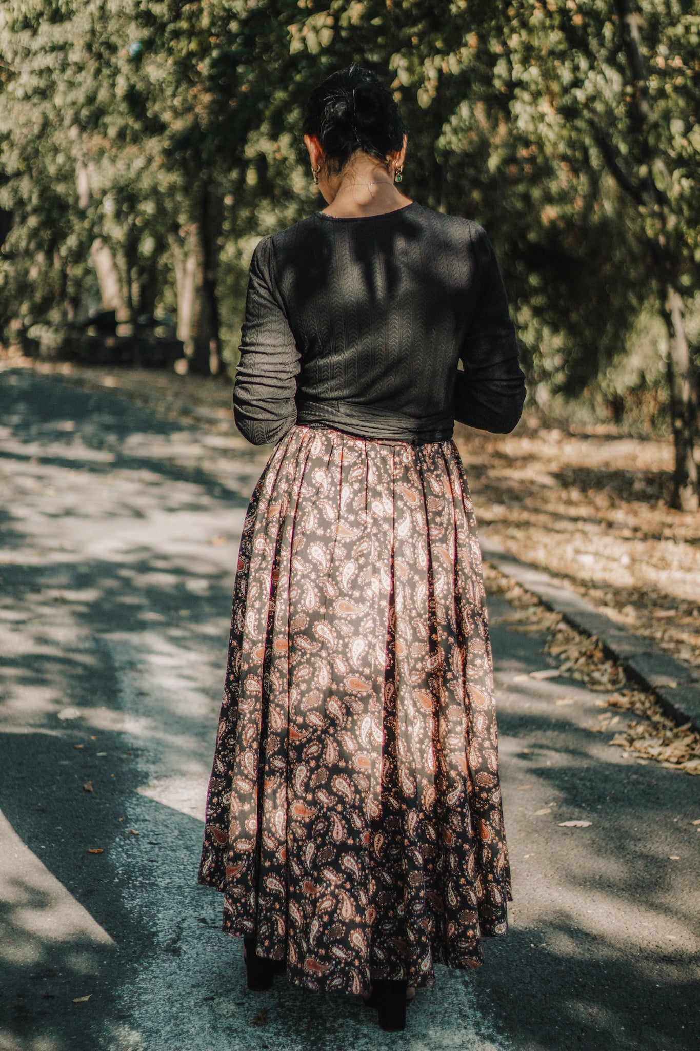 woman wearing a modest nursing black dress