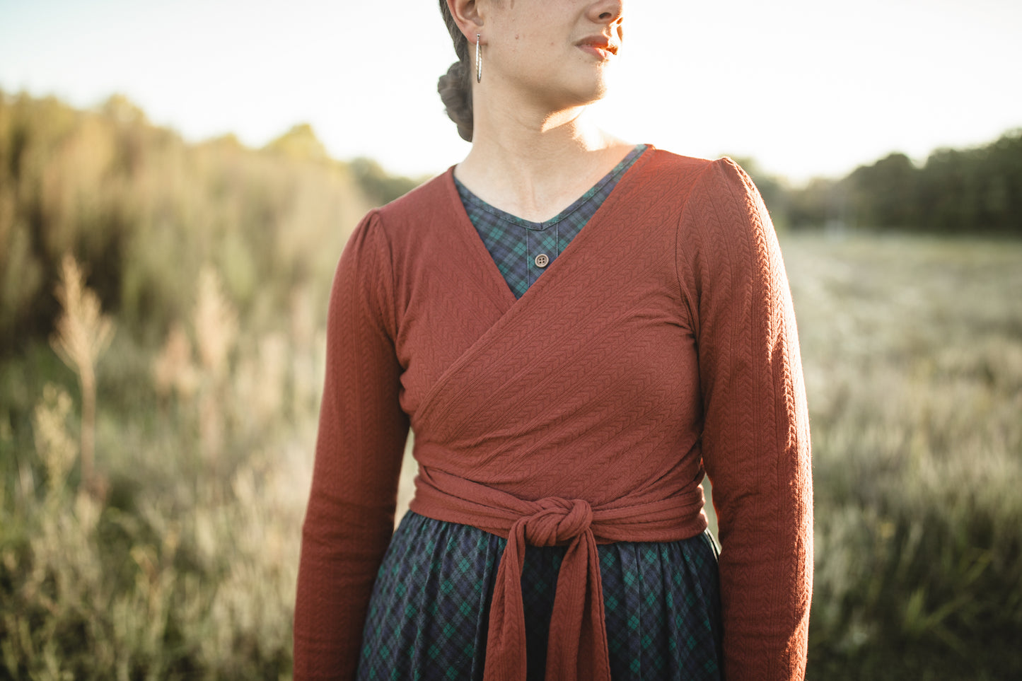 Woman in modest nursing wrap dress outdoors