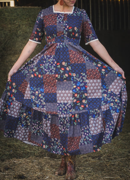 woman wearing a modest nursing patterned dress