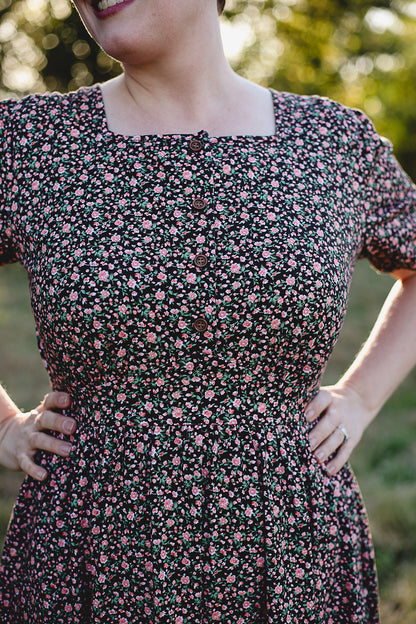 woman wearing a modest nursing floral dress