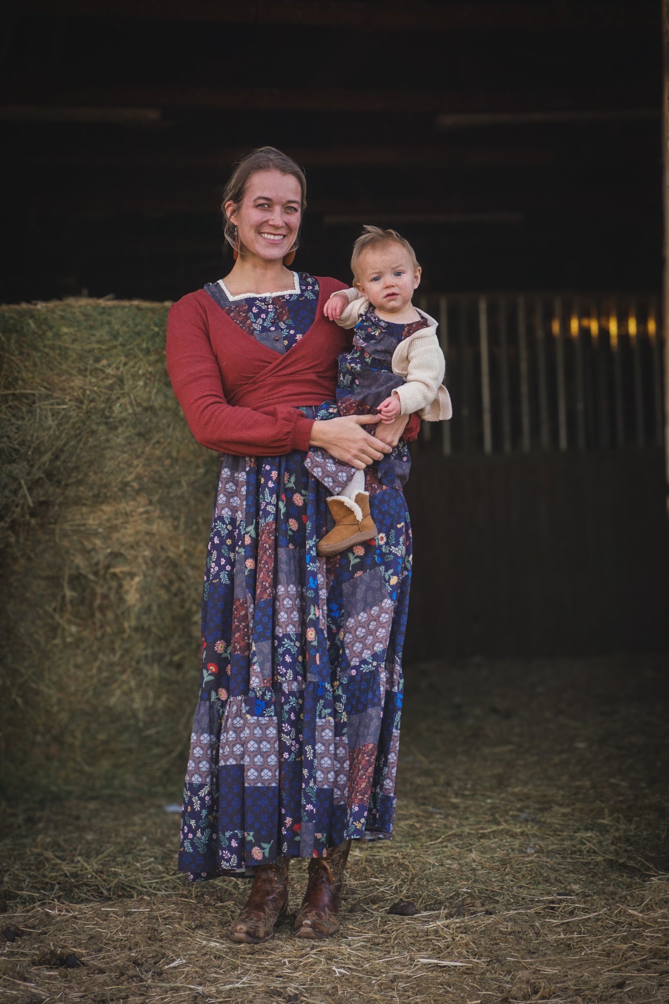 mother wearing a modest nursing patchwork dress with her daughter
