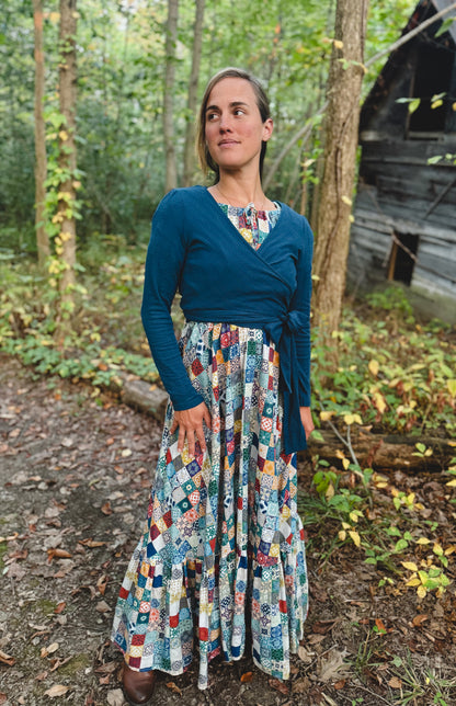 Woman in modest nursing patterned dress with cardigan