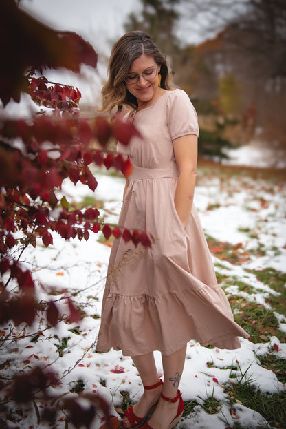 woman wearing a modest nursing floral dress