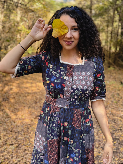 woman wearing a modest nursing patterned dress