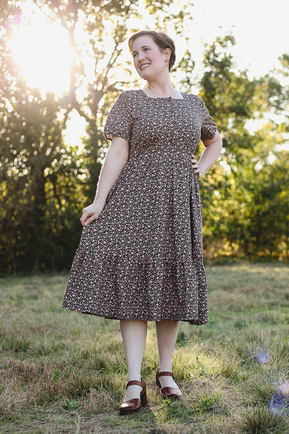 woman wearing a modest nursing floral dress