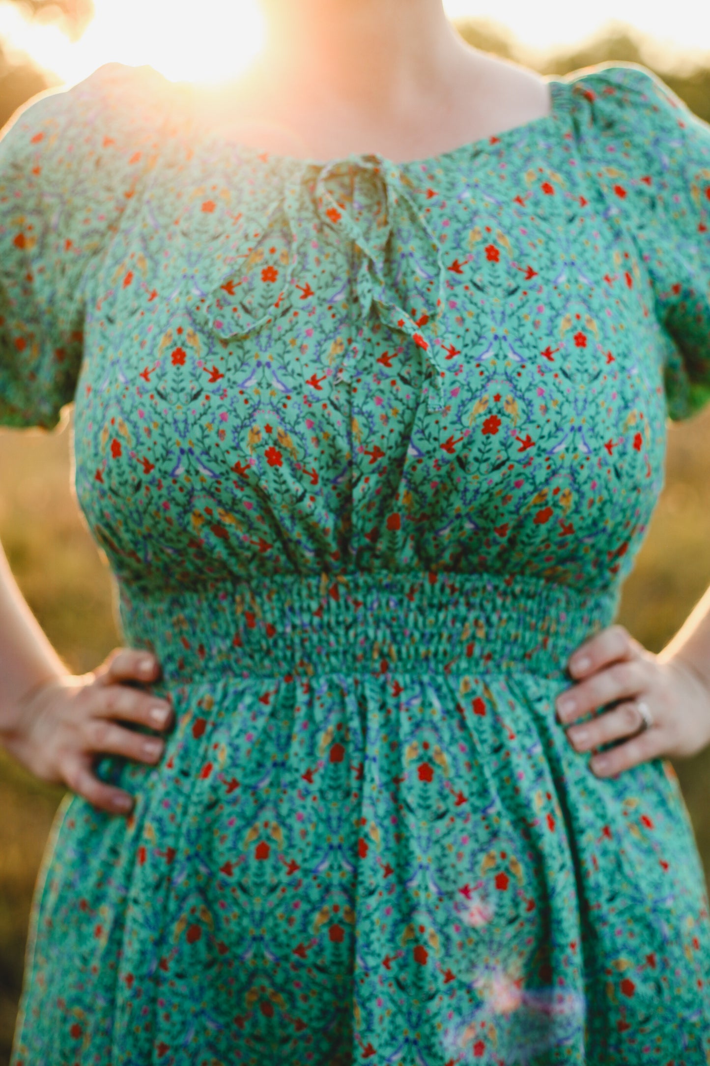 Person wearing modest nursing dress outdoors