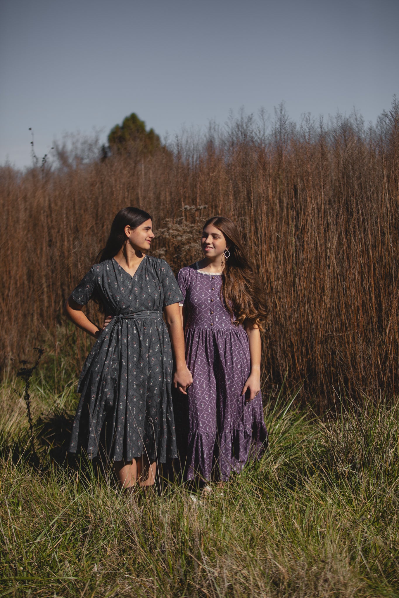 Modest nursing dresses, mother and daughter in field