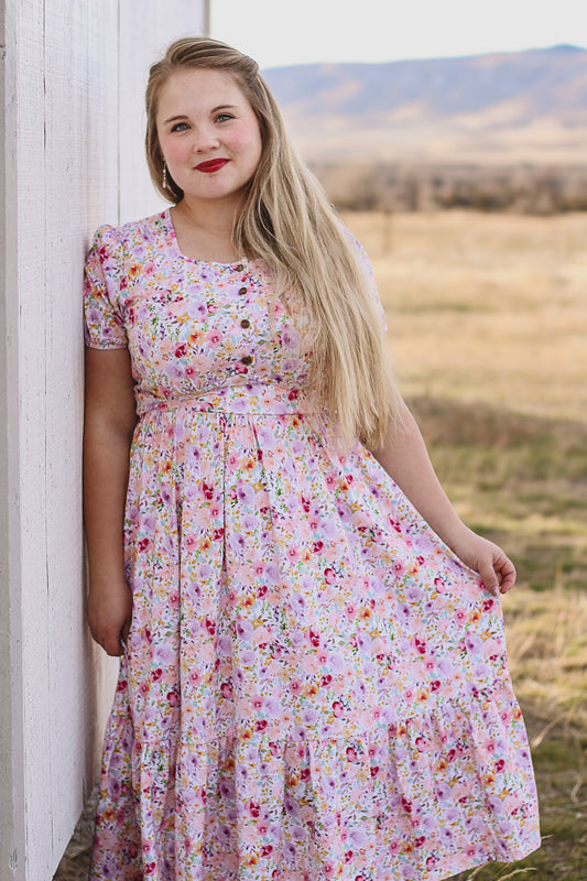 woman wearing a modest nursing floral dress