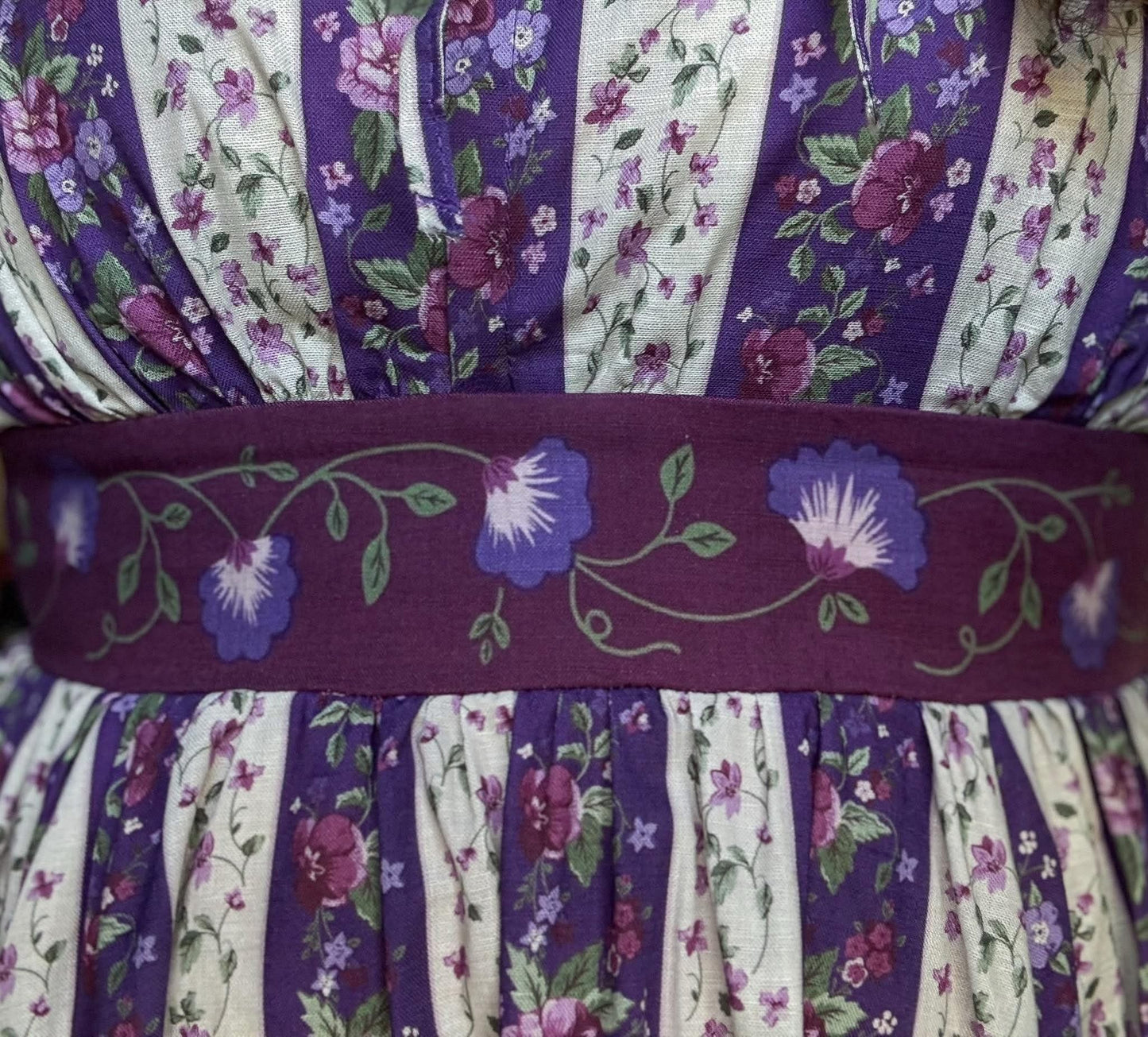 Floral fabric with purple belt detail