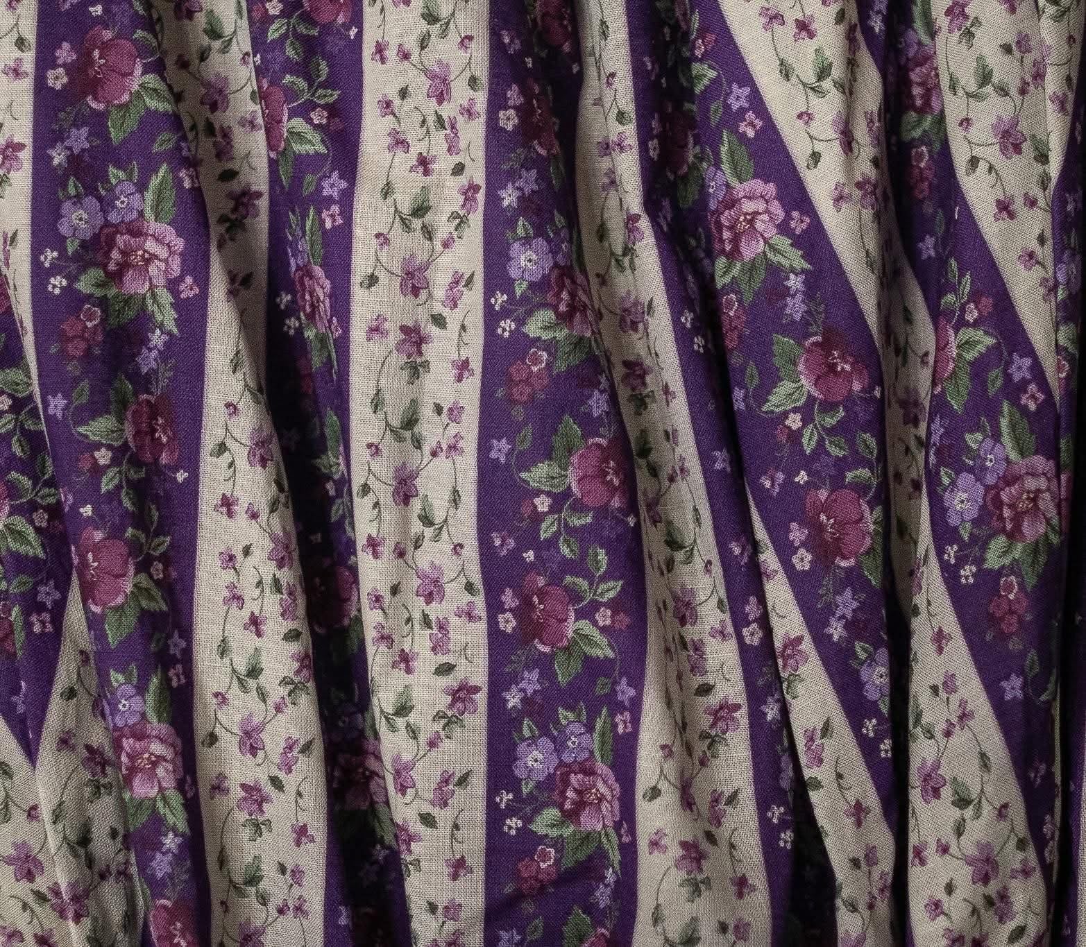 Floral patterned fabric with purple and white stripes