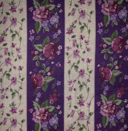 Floral patterned fabric with purple and white stripes